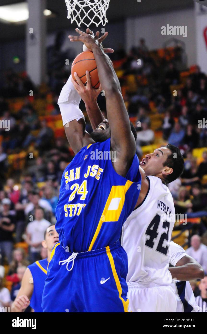 Utah State's Tai Wesley and San Jose State's Brylle Kamen compete for a