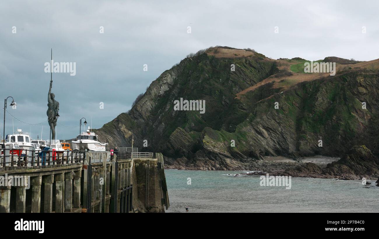 Ilfracombe Harbour with Verity, a statue by Damien Hirst. Devon. England. UK 2023 Stock Photo