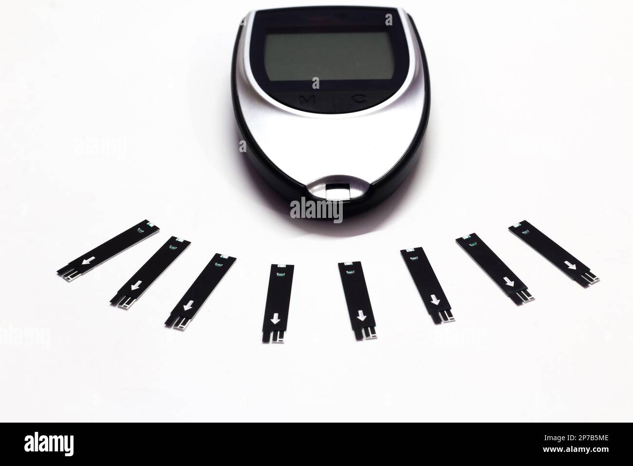 Blood glucose monitor medical device on a white background Stock Photo