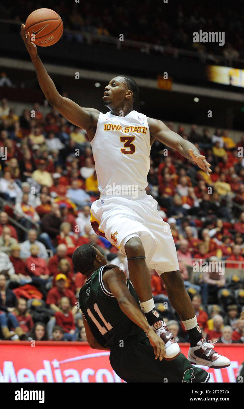 Iowa State's Melvin Ejim (3) tries to lay up the ball over Chicago
