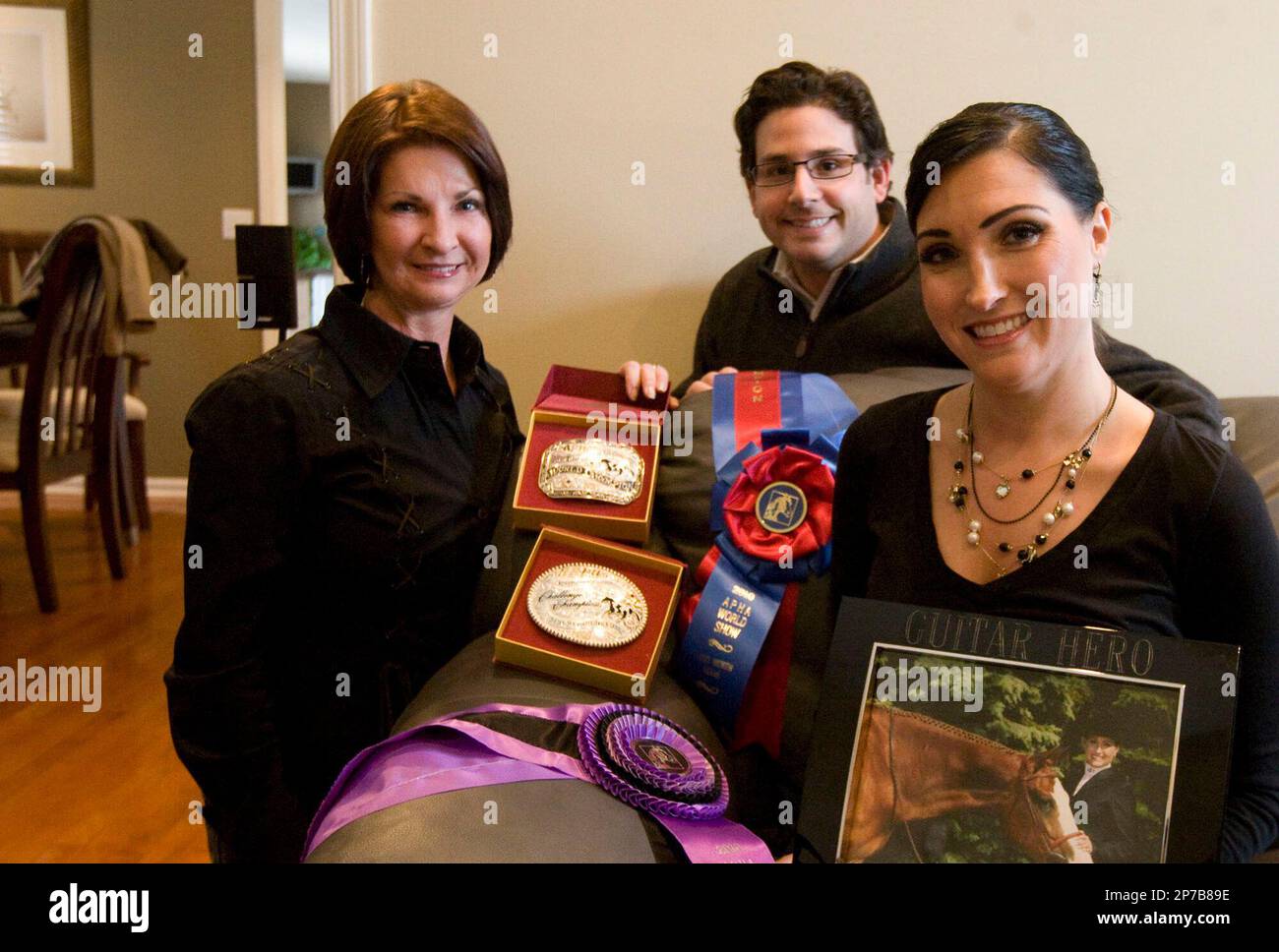 In this Dec. 9, 2010, photo Michelle Sloan sits with her husband, Drew ...