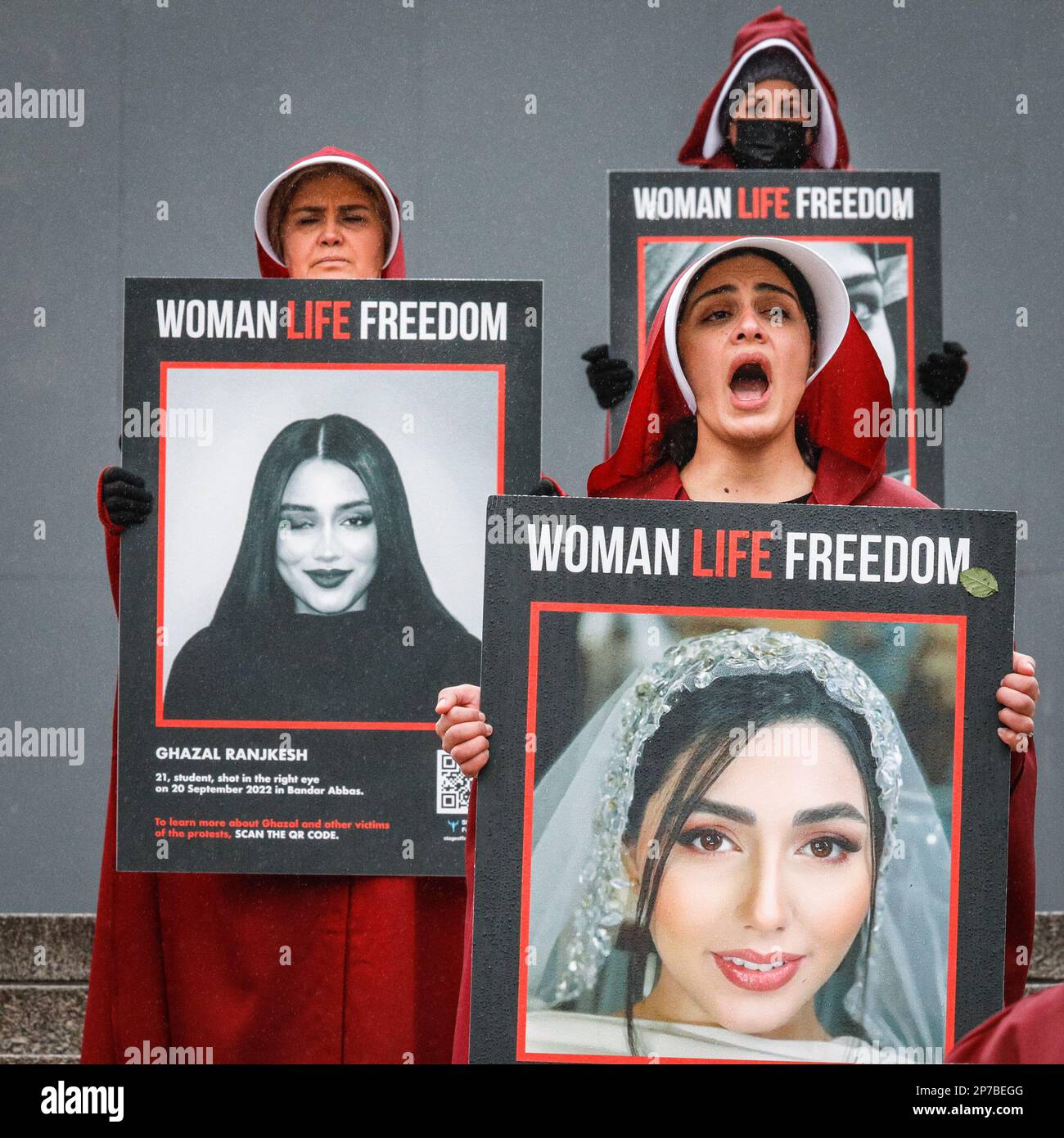 London, UK. 08th Mar, 2023. The women march in Whitehall and stop briefly on Tafalgar Square, with each woman holding a placard of a woman killed. Women march through central London and all the way to the Iranian embassy in solidarity with women in Iran who are demonstrating for human rights in the country, where equality and women's rights have been severely restricted. Credit: Imageplotter/Alamy Live News Stock Photo
