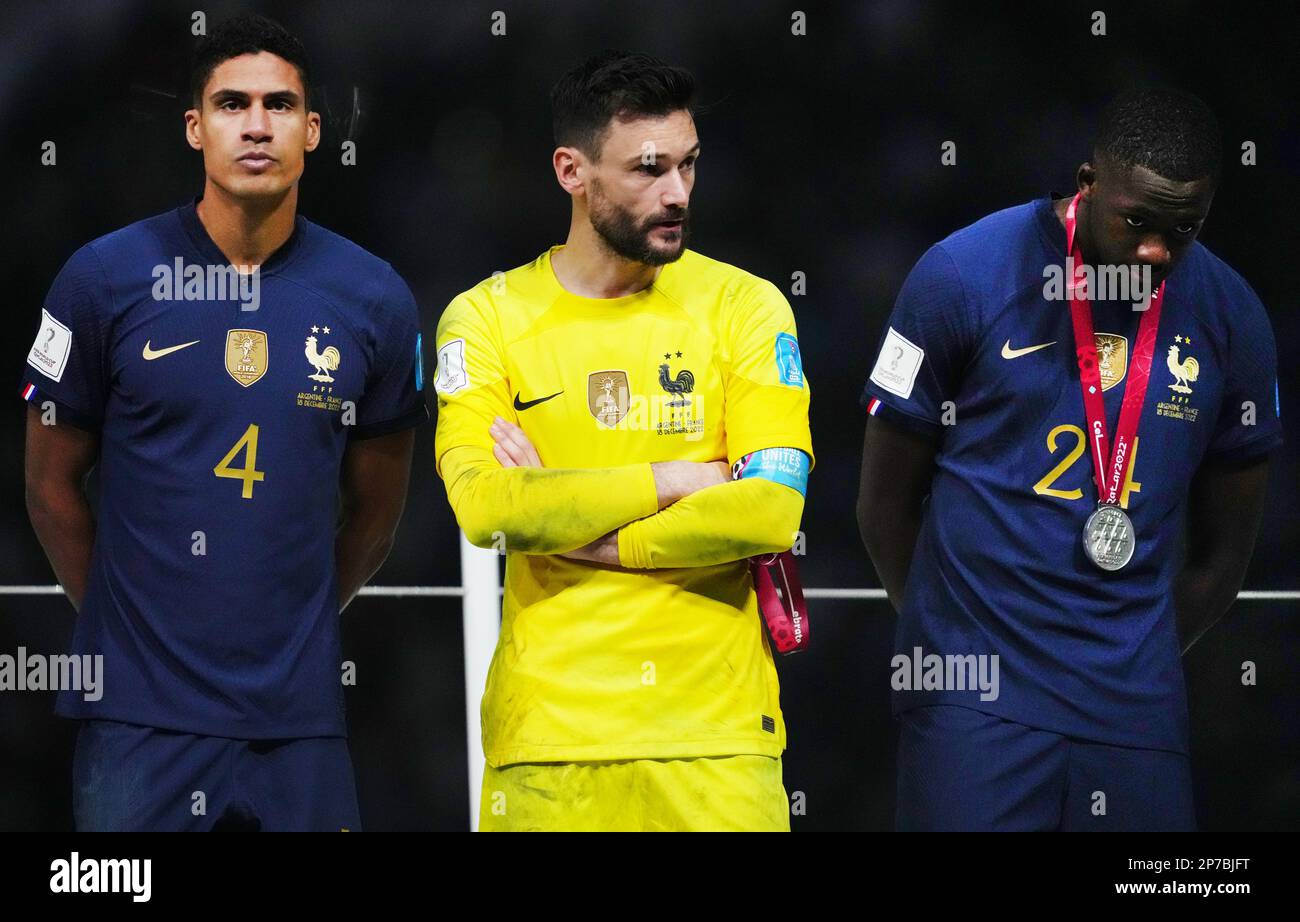 France captain Hugo Lloris with teammates Raphael Varane (left) and