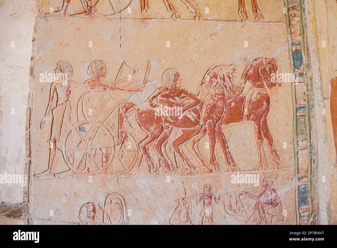 Egypt, Saqqara,  tomb of Horemheb,  inner room, East Wall South side, horses and charioteers are waiting for Horemheb and high officers. Stock Photo