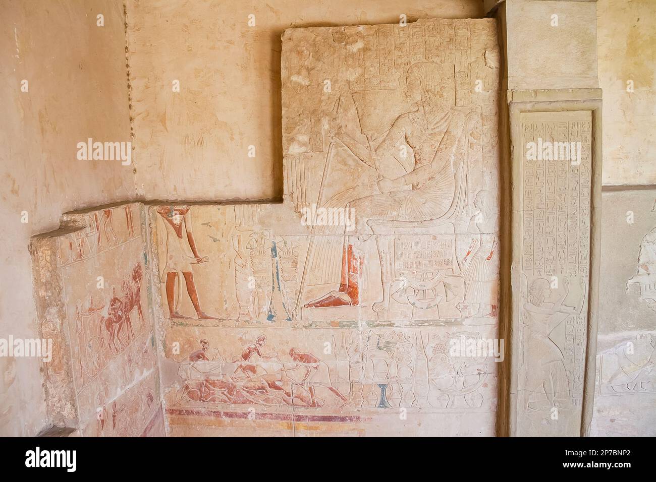 Egypt, Saqqara,  tomb of Horemheb,  inner room, corner of the East wall and the South wall. Horemheb seated. Stock Photo