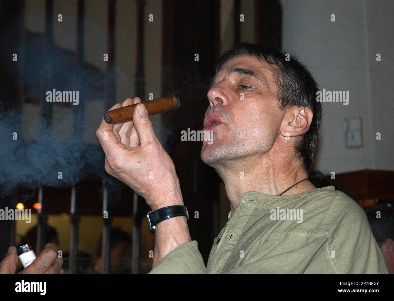 British actor Jeremy Irons smokes a cigar after being named as the Cigar  Man of the Year, during the International Cigar festival in Havana, Cuba,  Feb. 25, 2005. (AP Photo/Manuel Munoa, Prensa