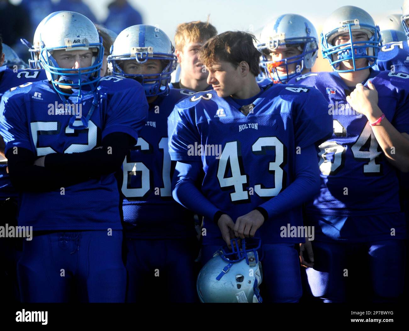 Holton football players react to their 2416 loss to Louisburg in the