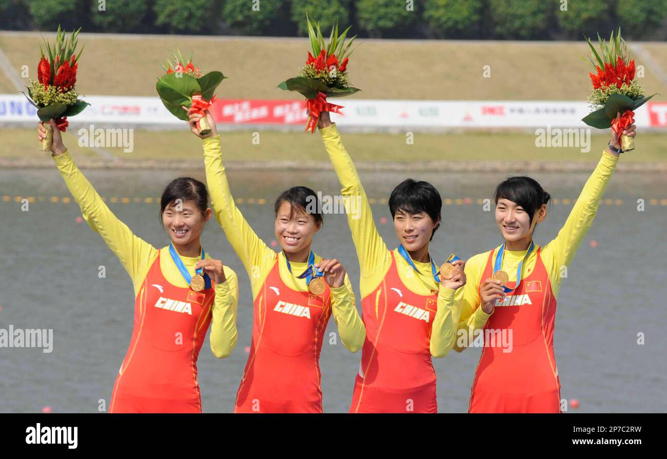 The Chinese women's Lightweight Quadruple Sculls rowing team wave from ...