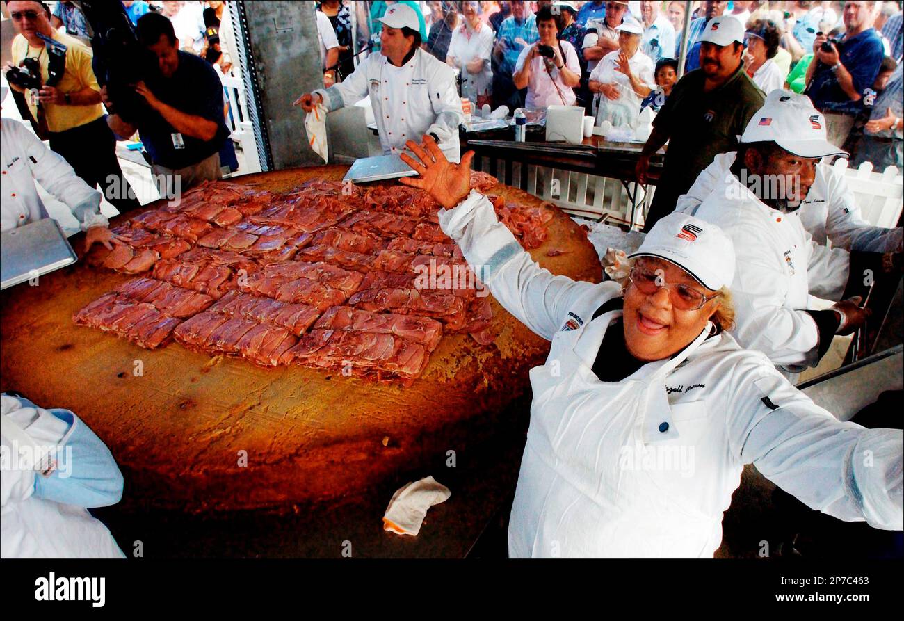 A biscuit maker at the Smithfield Inn for forty years, Mozell Brown rejoices as 500 pounds of