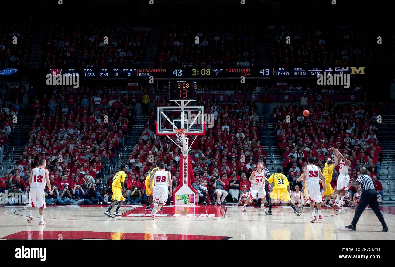 Wisconsin Badgers guard Travon Hughes (3) shoots a jump shot to take the  lead during a Big Ten Conference NCAA basketball game against the Michigan  Wolverines at the Kohl Center on January