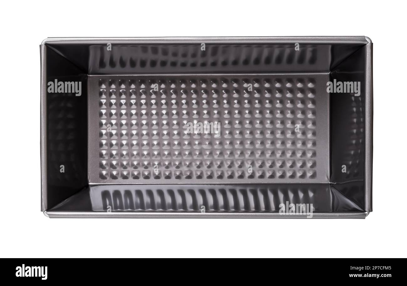 Empty baking tray cutout. Rectangular non-stick loaf pan isolated on a white background. Metal mold for homebaked bread, cake, pate, casserole. Baking Stock Photo