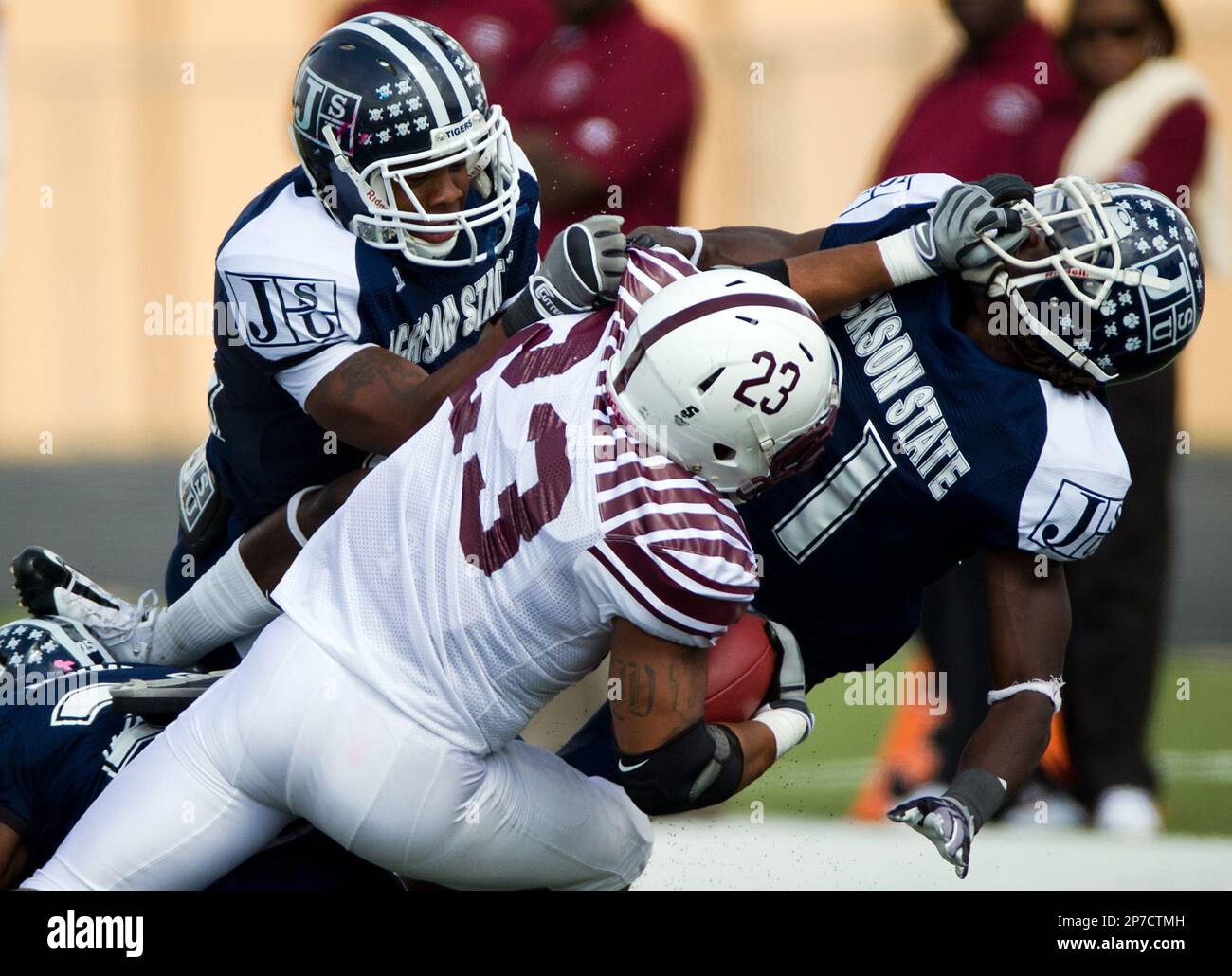 Texas Southern running back Marcus Wright (23) grabs the face mask