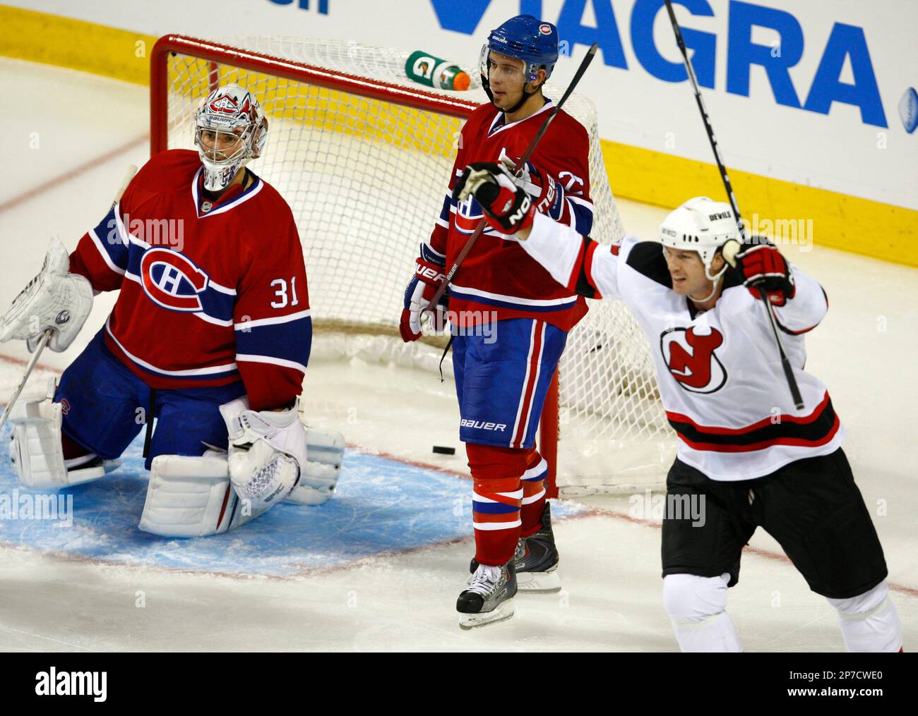 New Jersey Devils' head coach John MacLean, centre, leans on Rod