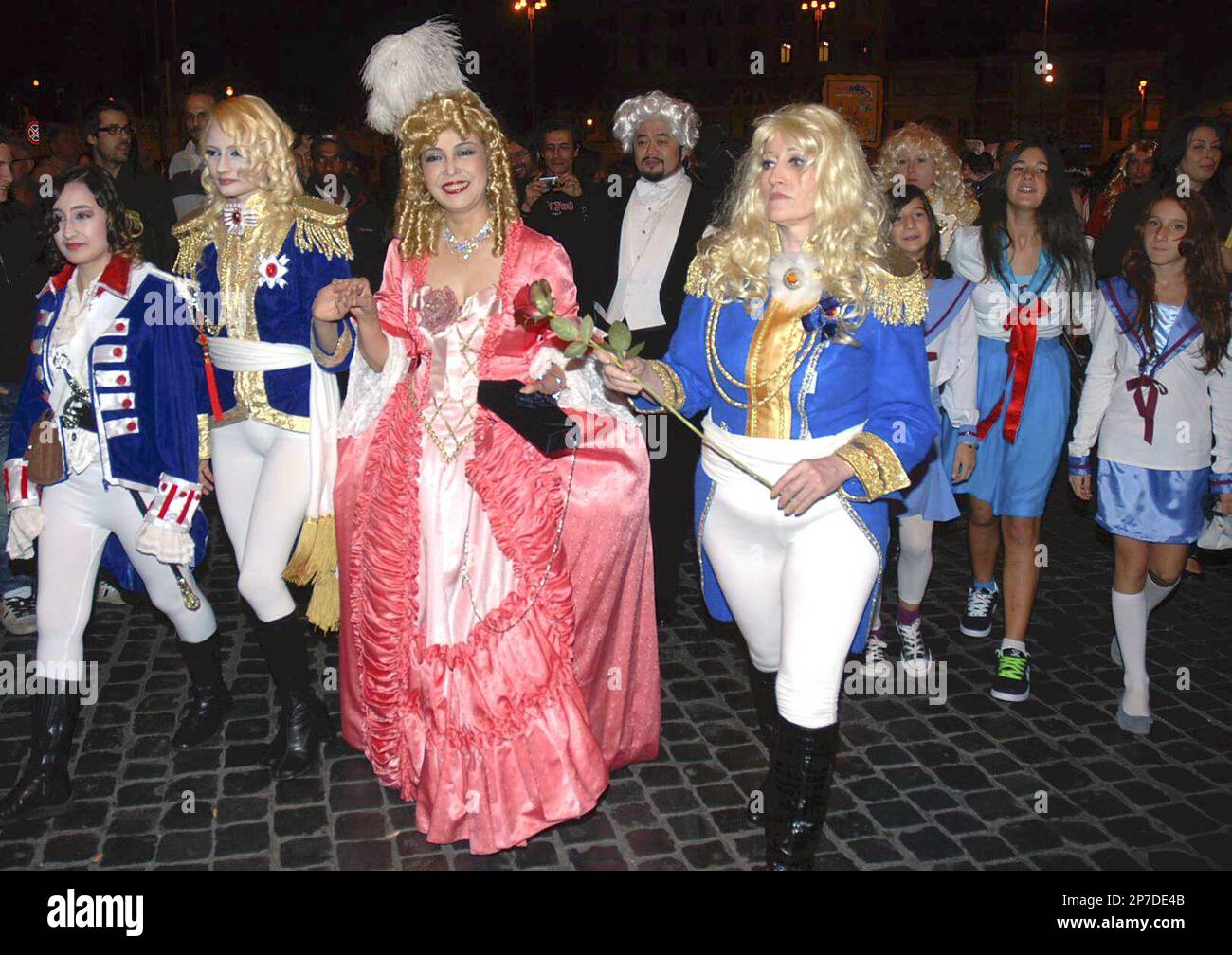 Riyoko Ikeda (center), Japanese manga-aritist known for “The Rose of  Versailles”, dresses up as Marie-Antoinette and walks to Spanish Steps in  Rome, on Tuesday on Sept. 28, 2010. About 50 Italian Manga-lovers