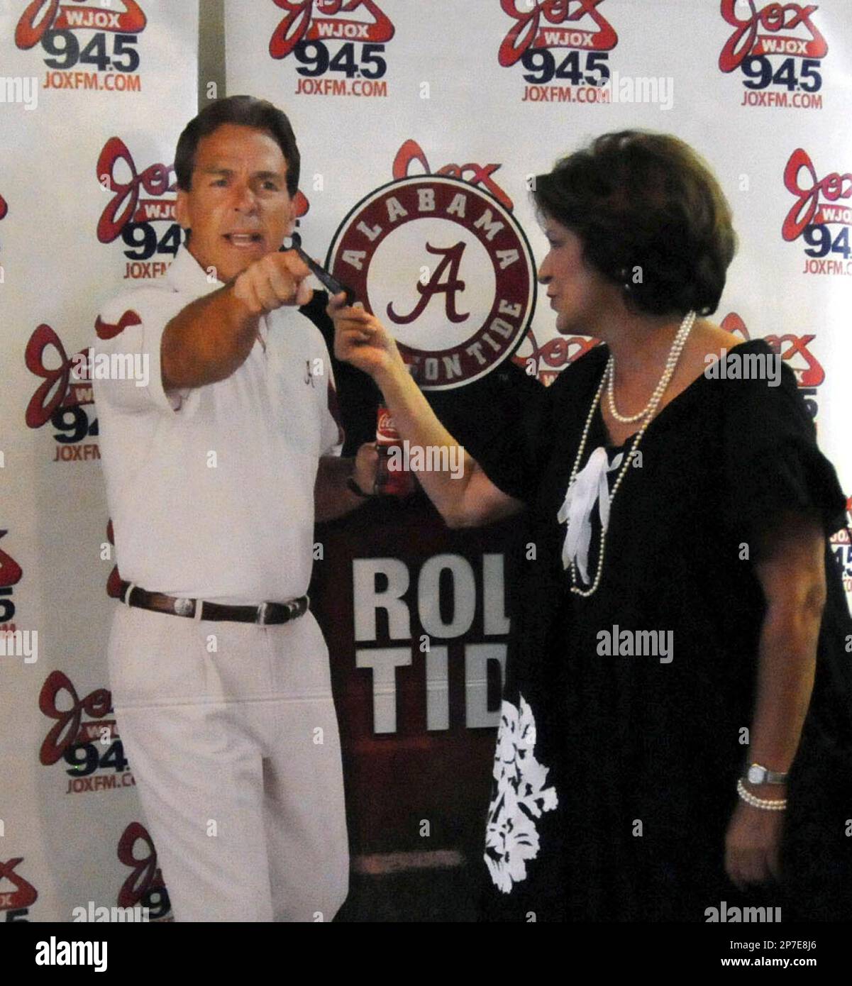 Terry Saban, wife of Alabama football coach Nick Saban, gestures and