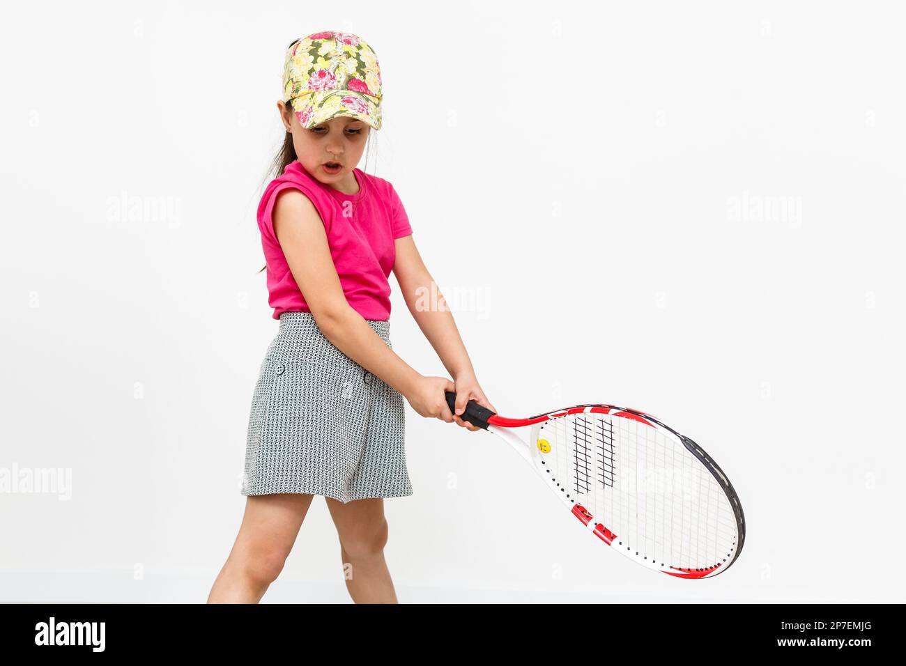 little girl with a tennis racket Stock Photo - Alamy