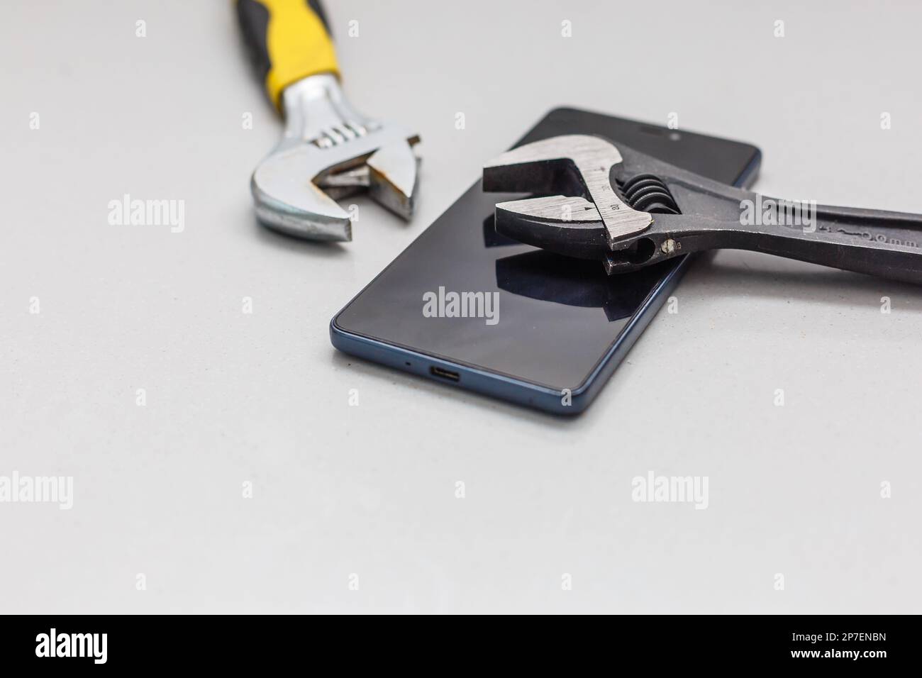 Picture Idea: Smartphone And Tools For Recovery Repair Phone Stock Photo