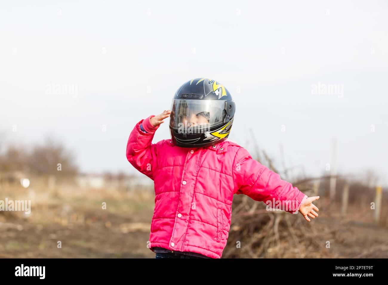 Little girl in a motorcycle helmet Stock Photo Alamy