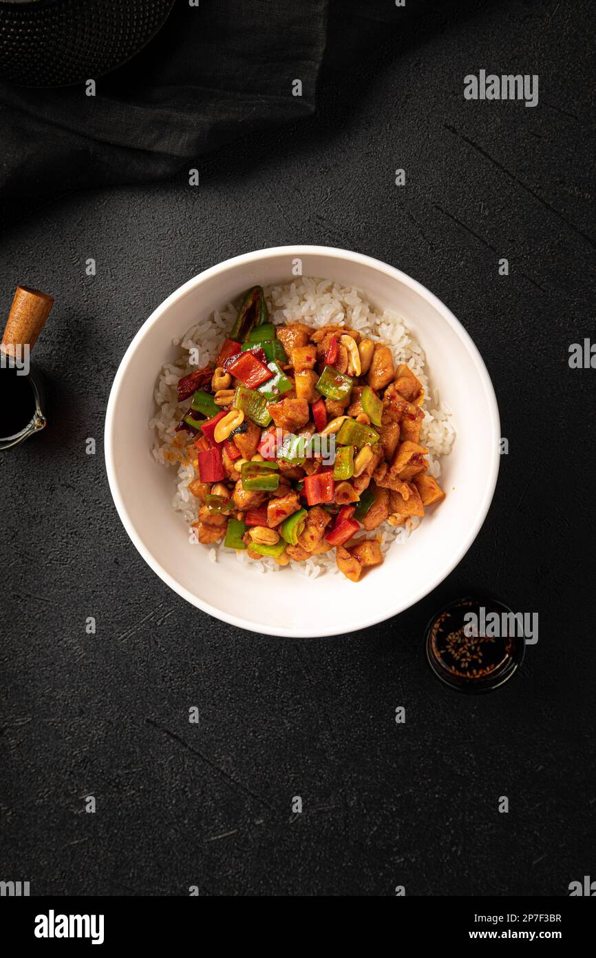 Chinese gong bao chicken with rice and peanuts Stock Photo Alamy