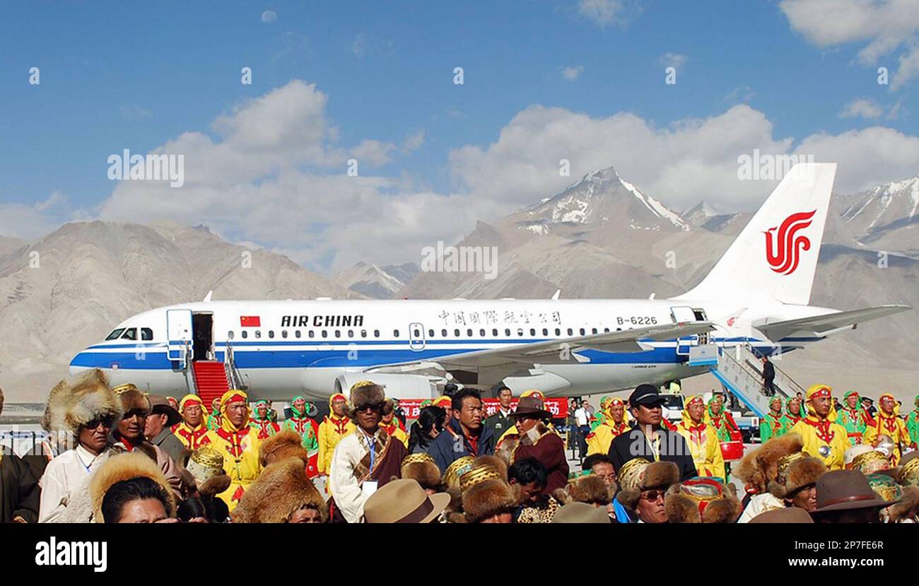 An Airbus A319 plane lands during a ceremony to mark the virgin flight at  the newly-built Ngari Gunsa Airport in Ngari Prefecture in northwest  China's Tibet on Friday, July 1, 2010. The