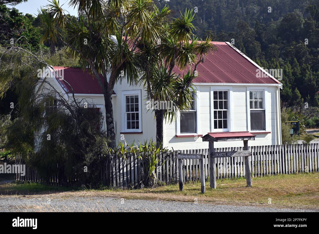 The Old School House, in the middle of Okarito village, was built in 1901 and restored in 1990. It was restored by DOC, the YHA and local community. Stock Photo