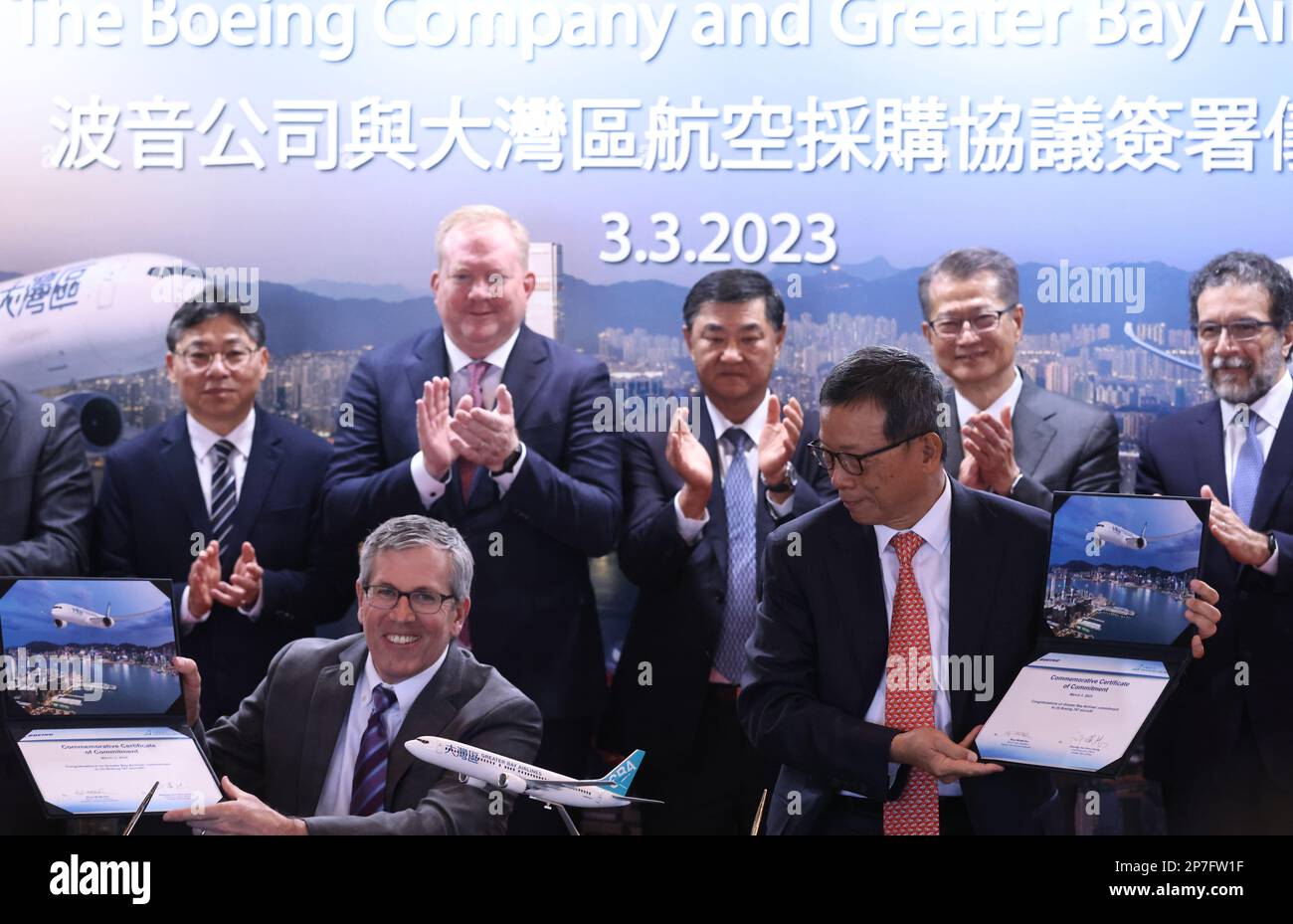 (front row; left) Brad McMullen, Senior Vice President,  Boeing Commercial Airplanes and Stanley Hui Hon-chung, Chief  Executive Officer, Greater Bay Airlines, during  the Signing Ceremony between Greater Bay Airlines and Boeing,  at Island Shangri-La Hotel.  The airlines has ordered 15 Boeing 737-9 MAX aircraft and is eyeing five 787 Dreamliners. 03MAR23 SCMP /K. Y. Cheng Stock Photo