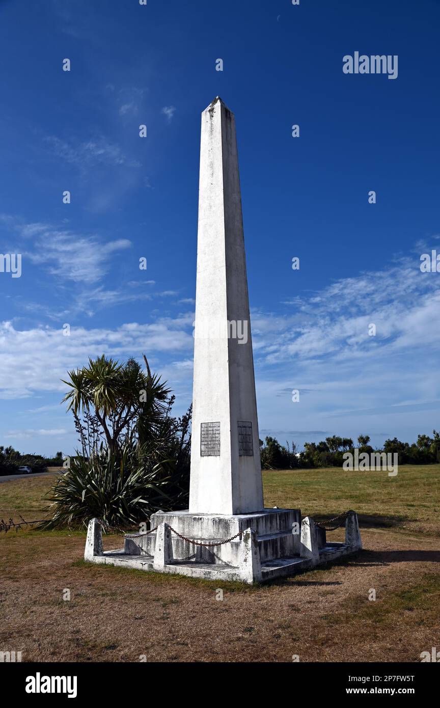 The Memorial Obelisk in the West Coast settlement of Okarito. It dates from 21st May 1940, New Zealands Centennial year. It is a registered monument. Stock Photo