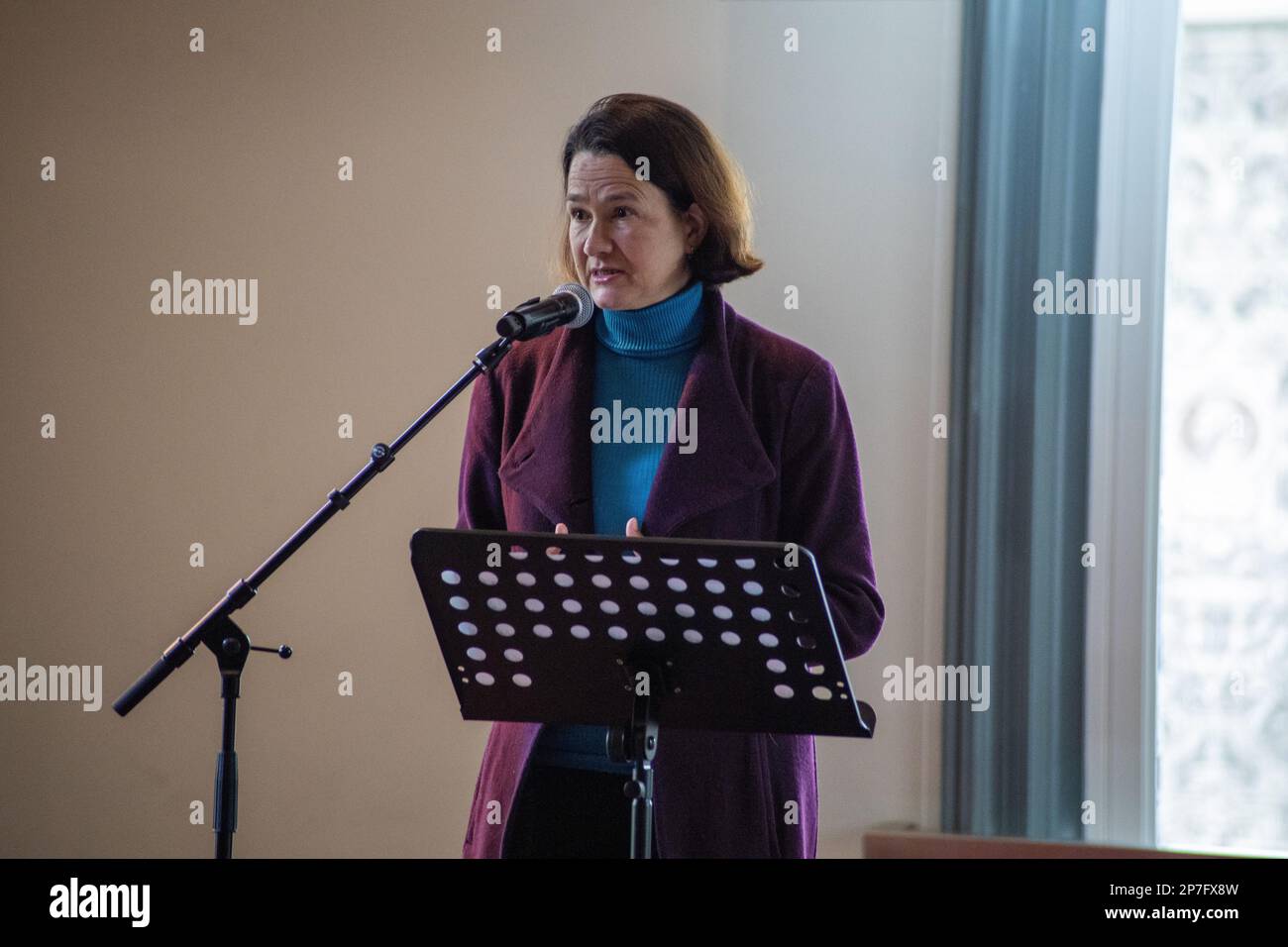 London, UK - March 8, 2023: Catherine West MP delivering a speech at the Royal Albert Hall in honor of International Women's Day. Organised by the Afghanistan and Central Asia Association, a group of Afghan, British, Iranian, and other nationalities, refugees and some Members of Parliament gathered together at the Royal Albert Hall to commemorate International Women's Day. The event was followed by speeches, music, dance, and an exhibition. Credit: Sinai Noor/Alamy Live News Stock Photo