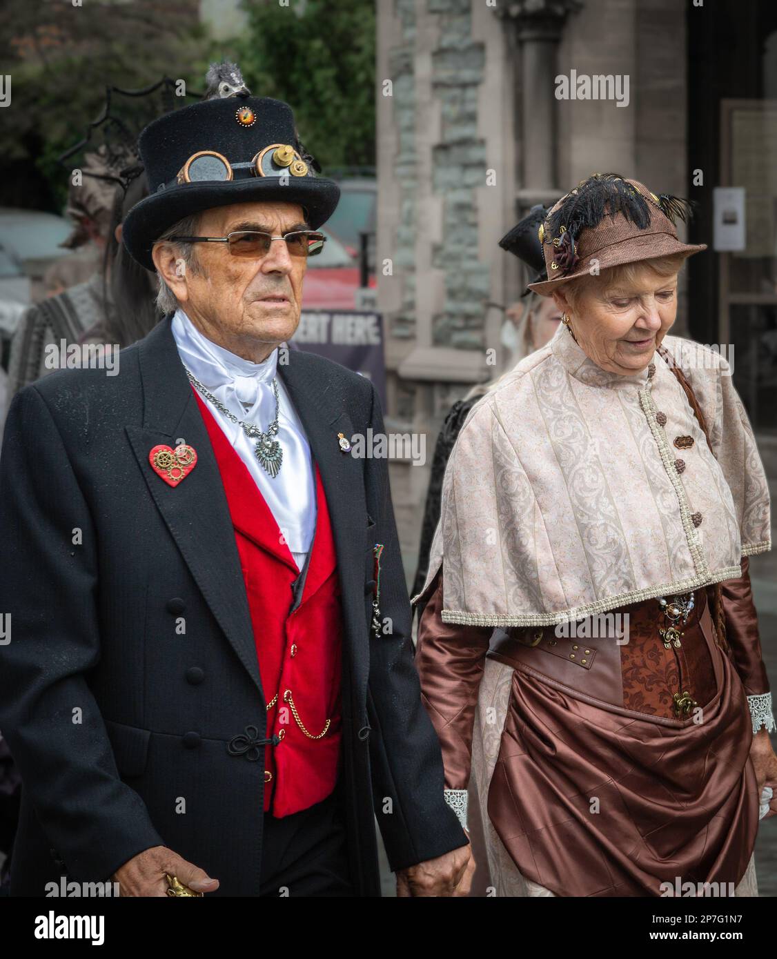 Two older steampunks that have a rerofuturistic Victorian appearance. Stock Photo