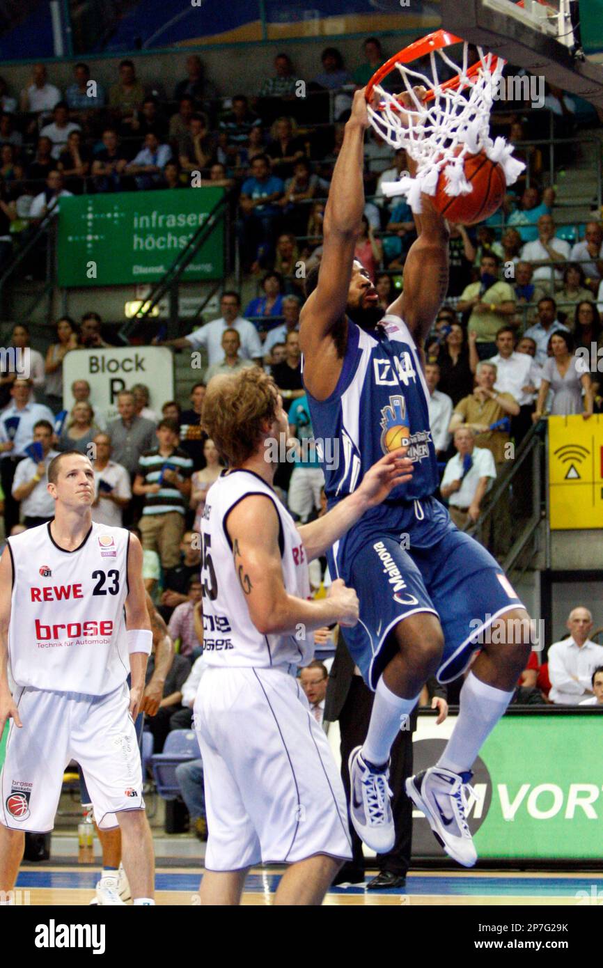 Derrick Allen, right, of Frankfurt Skyliners scores during game two of