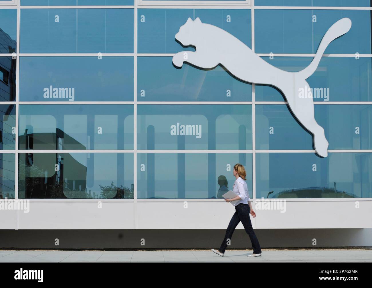 Herzogenaurach, Germany : Puma logo on a facade. Puma is a major german  multinational company that produces athletic, casual footwear, sportswear,  hea Stock Photo - Alamy