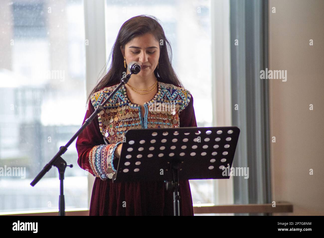 London, UK - March 8, 2023: Rabia Nasimi delivering a speech at the Royal Albert Hall in honor of International Women's Day. Organised by the Afghanistan and Central Asia Association, a group of Afghan, British, Iranian, and other nationalities, refugees and some Members of Parliament gathered together at the Royal Albert Hall to commemorate International Women's Day. The event was followed by speeches, music, dance, and an exhibition. Credit: Sinai Noor/Alamy Live News Stock Photo