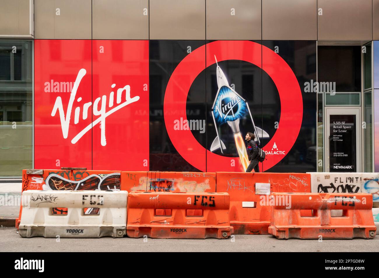 Advertising in the vacant retail spaces of the Virgin Hotel in the NoMad neighborhood of New York promotes other Virgin endeavors, seen on Wednesday, March 1, 2023. (© Richard B. Levine) Stock Photo