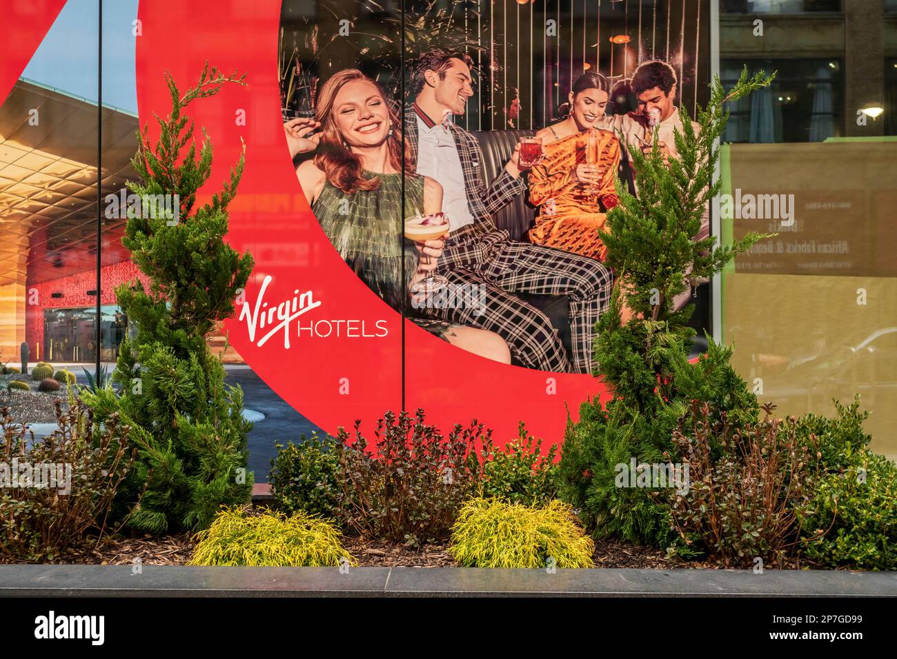 Advertising in the vacant retail spaces of the Virgin Hotel in the NoMad neighborhood of New York promotes other Virgin endeavors, seen on Wednesday, March 1, 2023. (© Richard B. Levine) Stock Photo