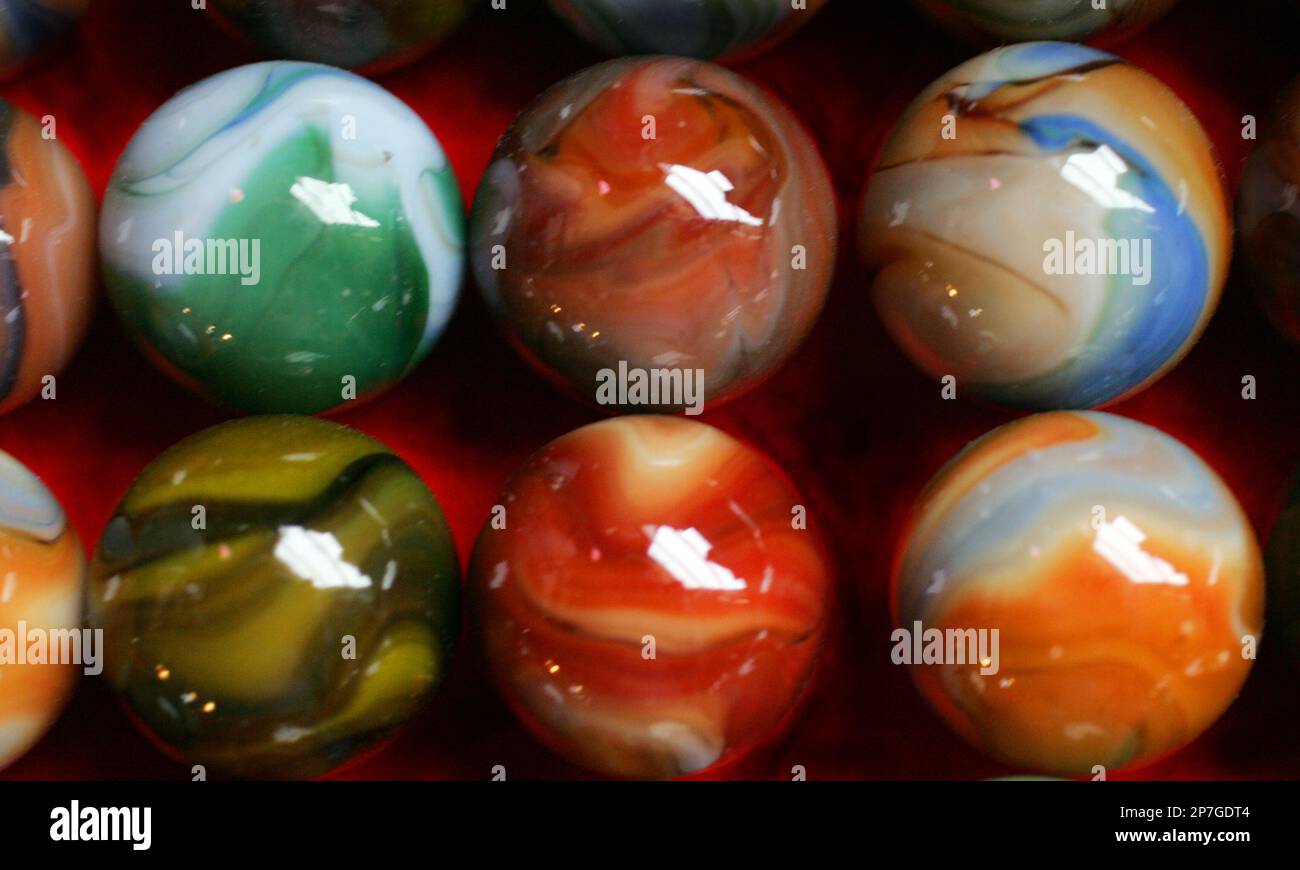 In this March 9, 2006 photo, unique glass marbles made by Jabo, Inc