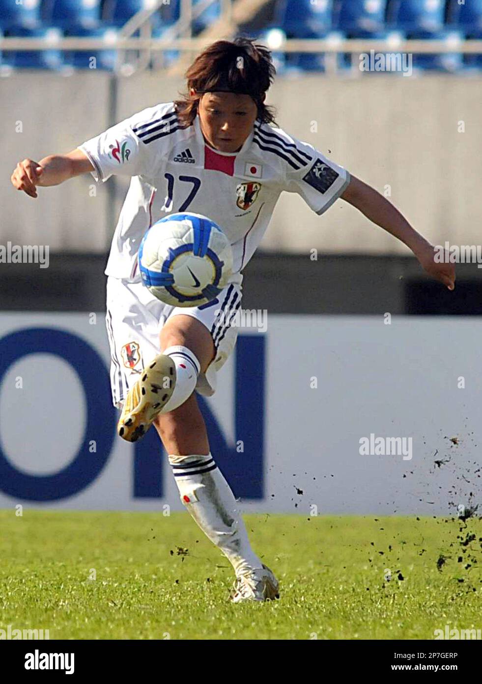 Japan's Kamionobe Megumi shoots against Thailand during a soccer match at  the 2010 AFC Women's Asian Cup in Chengdu in southwest China's Sichuan  province on Saturday, May 22, 2010. Japan won over