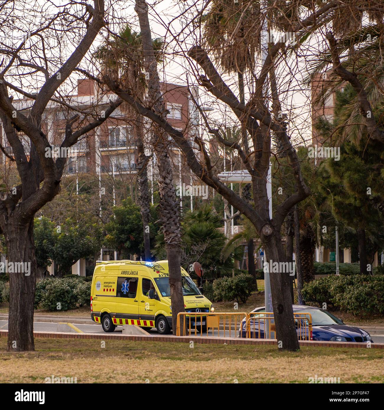 Barcelona,Spain-February 22,2023: An ambulance drives by a street in the afternoon Stock Photo