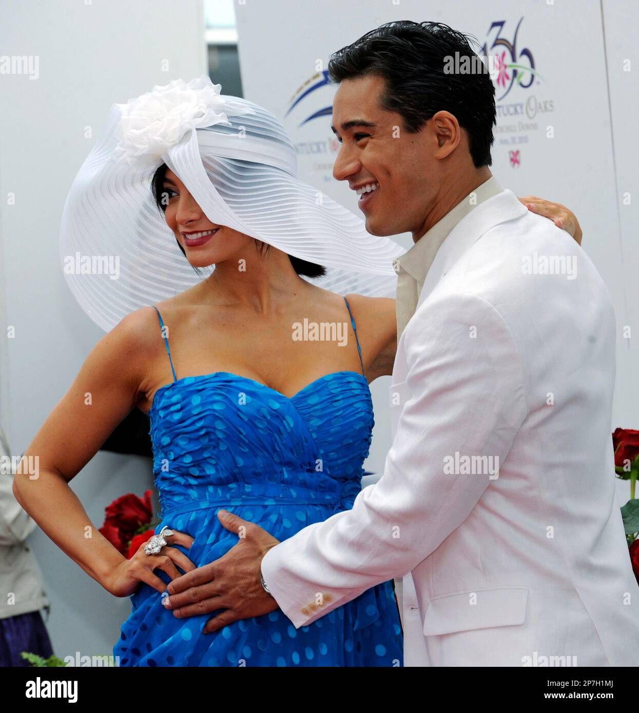 Mario Lopez and girlfriend Courtney Mazza arrive before the 136th