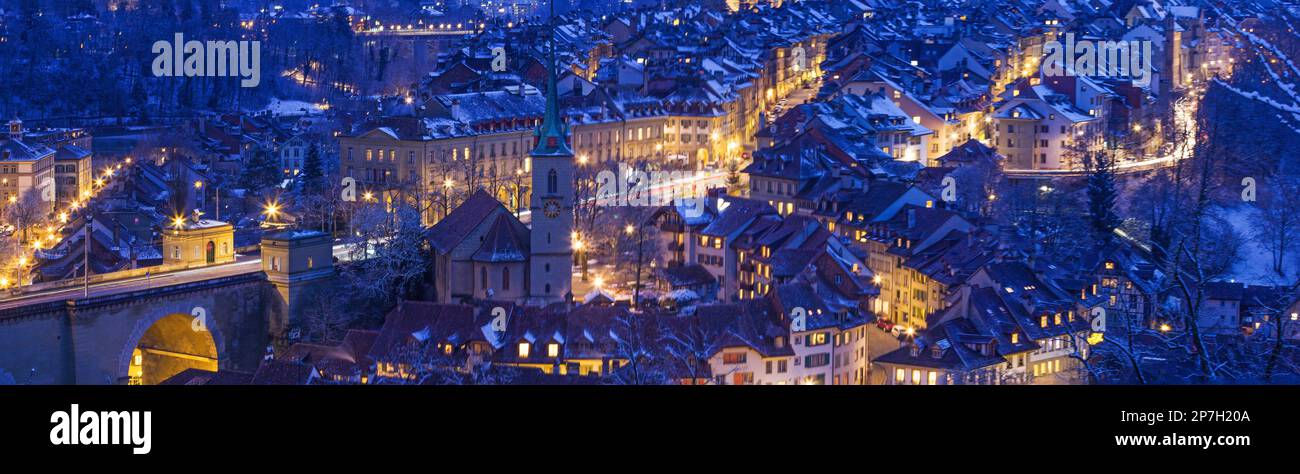 Banner of the old twon of Bern in winter blue hour with snowy and illuminated buildings, Rosengarten, Bern, UNESCO, Switzerland Stock Photo