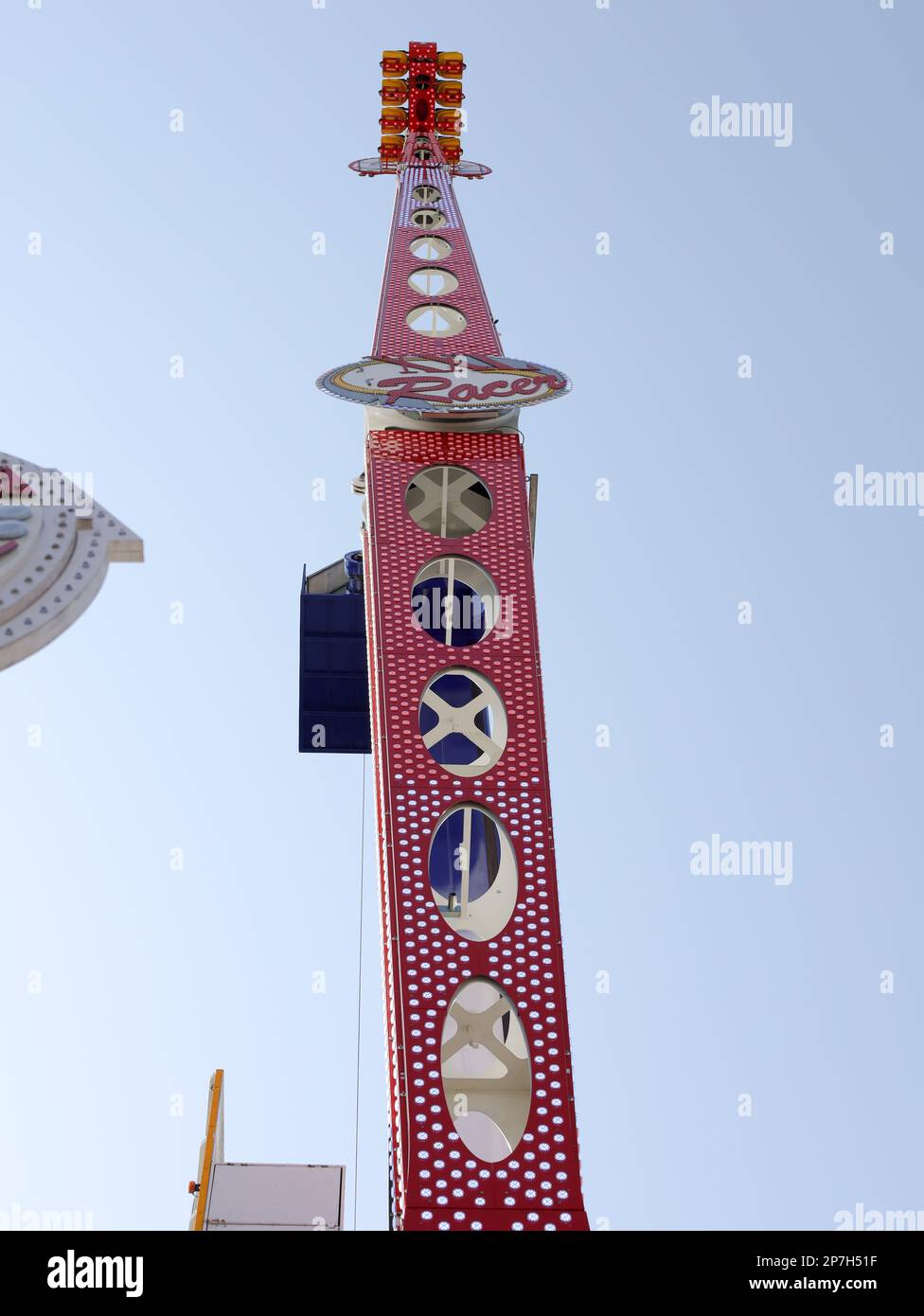 colorful booths and fun rides at a fairground Stock Photo - Alamy