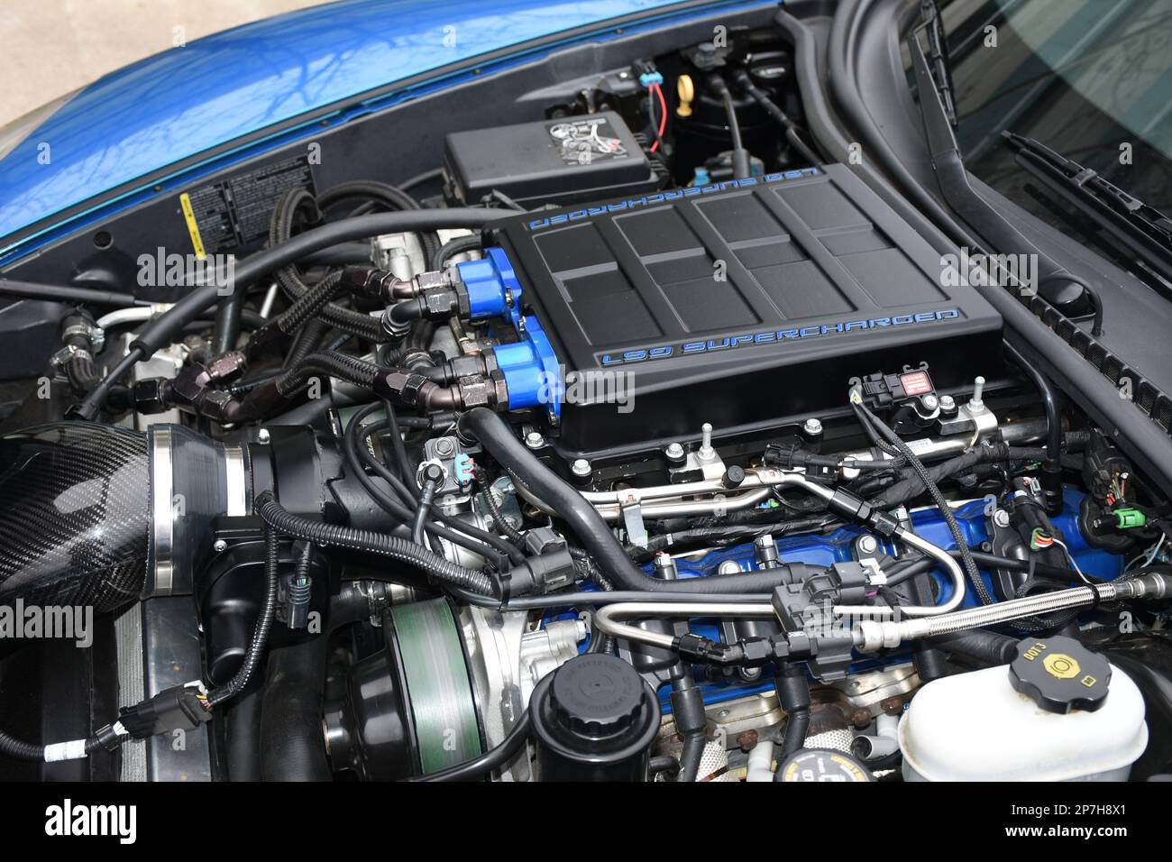 The LS9 Engine in a ZR1 Supercharged Corvette on display at a car show. Stock Photo