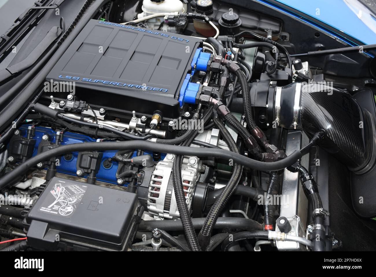 The LS9 Engine in a ZR1 Supercharged Corvette on display at a car show. Stock Photo