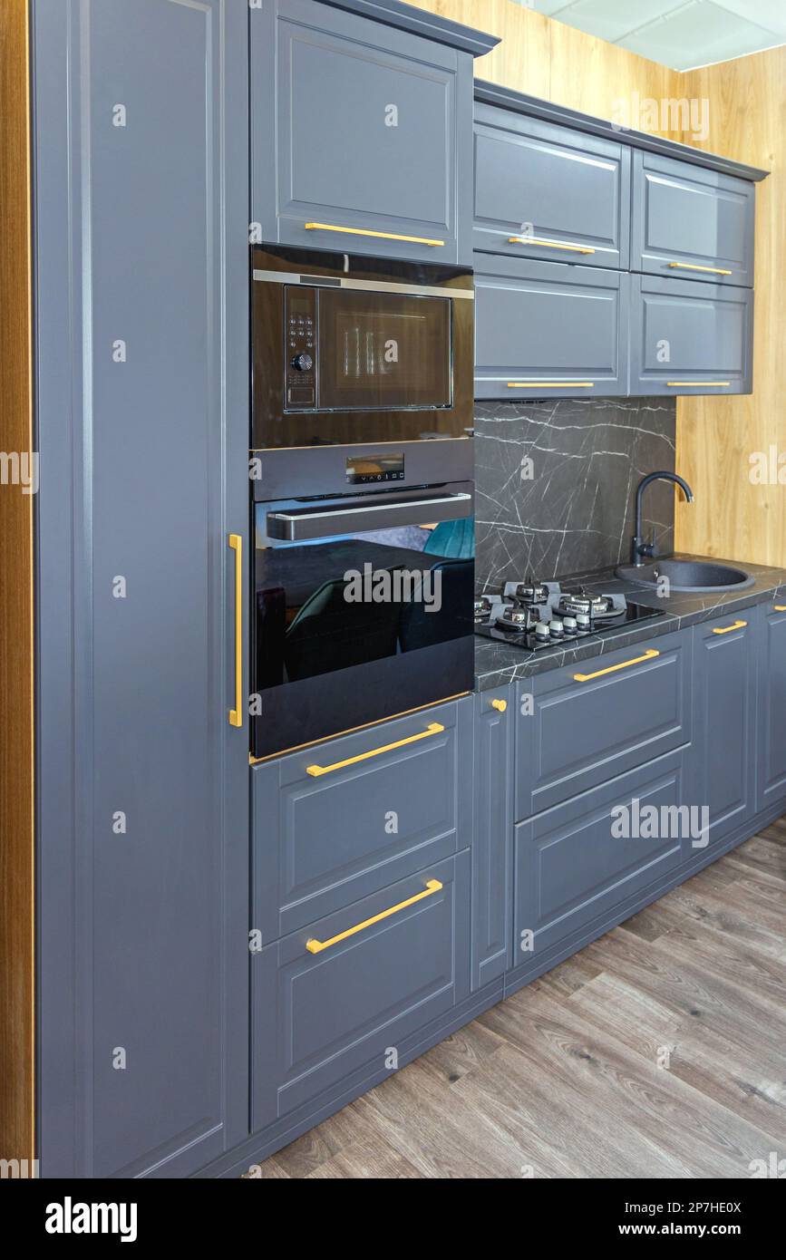 Black Microwave and Conventional Oven Built in Modern Kitchen Stock Photo Alamy