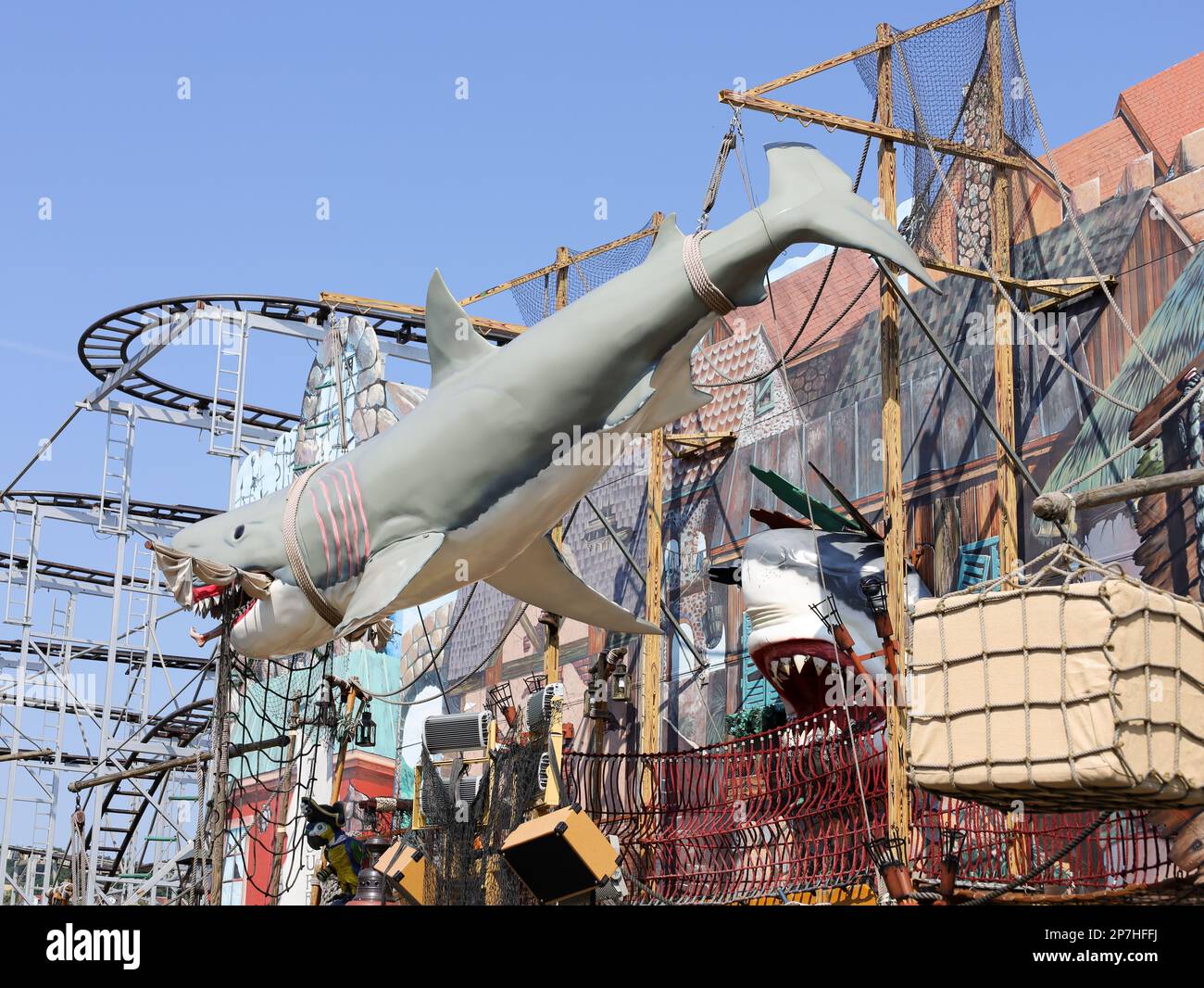 colorful booths and fun rides at a fairground Stock Photo - Alamy