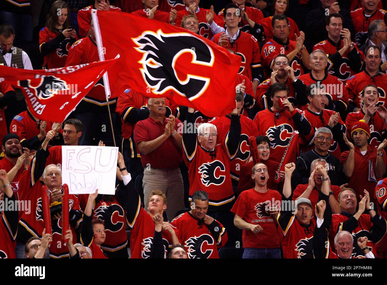 Calgary Flames' mascot Harvey the Hound in a sea of red with fans during a  recent NHL playoff hockey game in Calgary. Larry MacDougal/TCPI/The  Canadian Press (Canadian Press via AP Images Stock