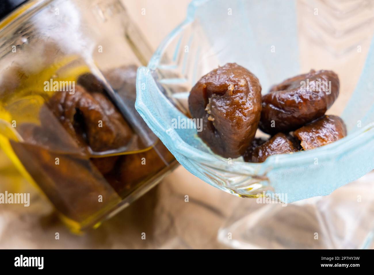Figs Soaked in Olive Oil - High Health Benefits  -Fig plant is one of the fruits mentioned in the Quran, along with olives - Islamic Medicine Stock Photo