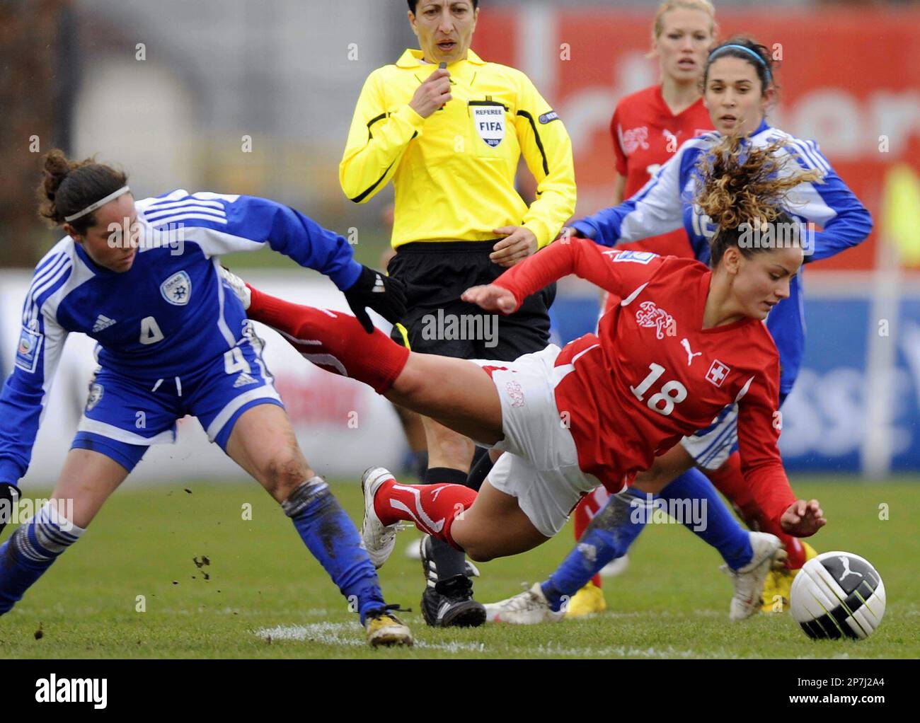 Switzerland's Jehona Mehmeli, right, fights for the ball with Israel's Moran Lavi, left, during the Women's 2011 World Cup qualification game between Switzerland and Israel at the Niedermatten stadium in Wohlen, Switzerland, Saturday, March 27, 2010. (AP Photo/Keystone/Walter Bieri) Stock Photo