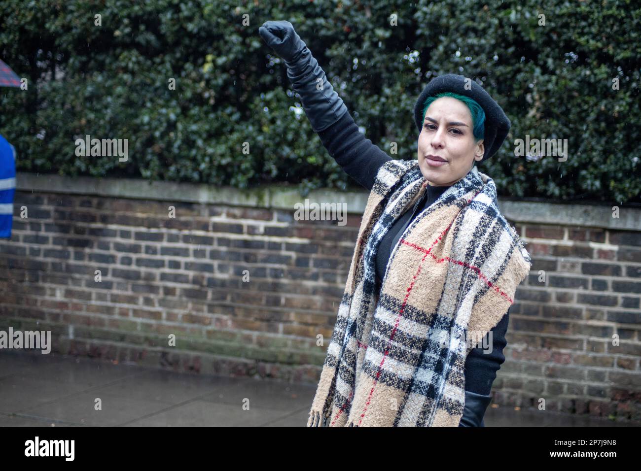 London, UK - March 8, 2023: On the occasion of International Women's Day, dozens of Iranians gathered outside the Islamic Republic of Iran's embassy in Kensington to demand women's freedom and hold up pictures of victims from recent protests in Iran. They chanted 'woman life freedom' while successfully blocking the road for a few minutes with their demonstration. Credit: Sinai Noor/Alamy Live News Stock Photo
