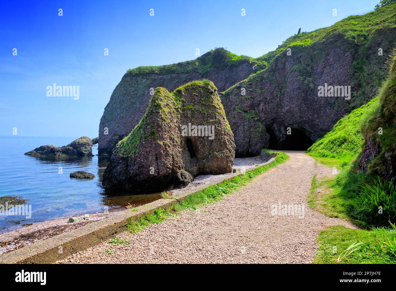 Cushendun caves along the Causeway Coast, Antrim, Northern Ireland Stock Photo