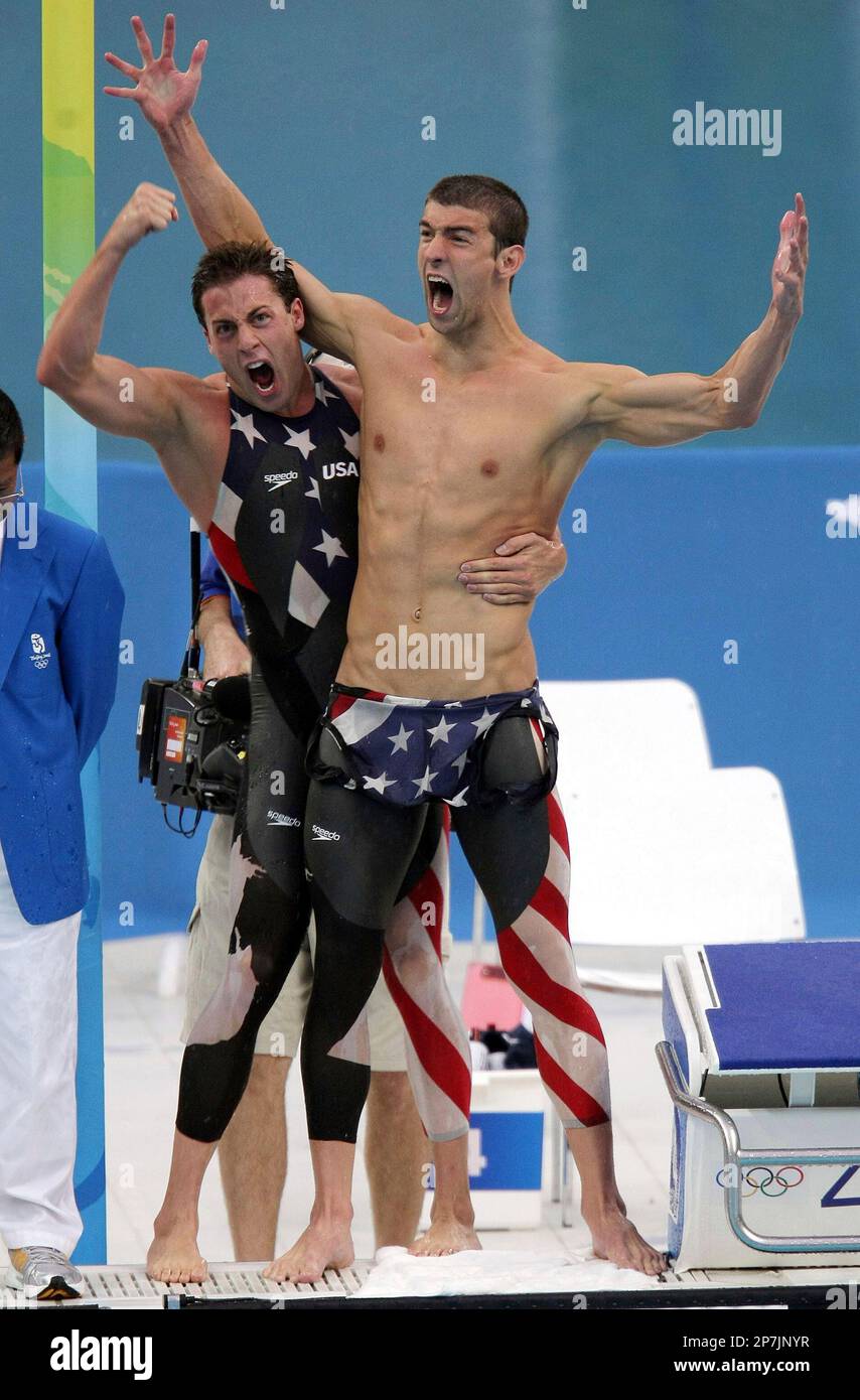 Garrett WeberGale and Michael Phelps celebrate their Gold medal win in